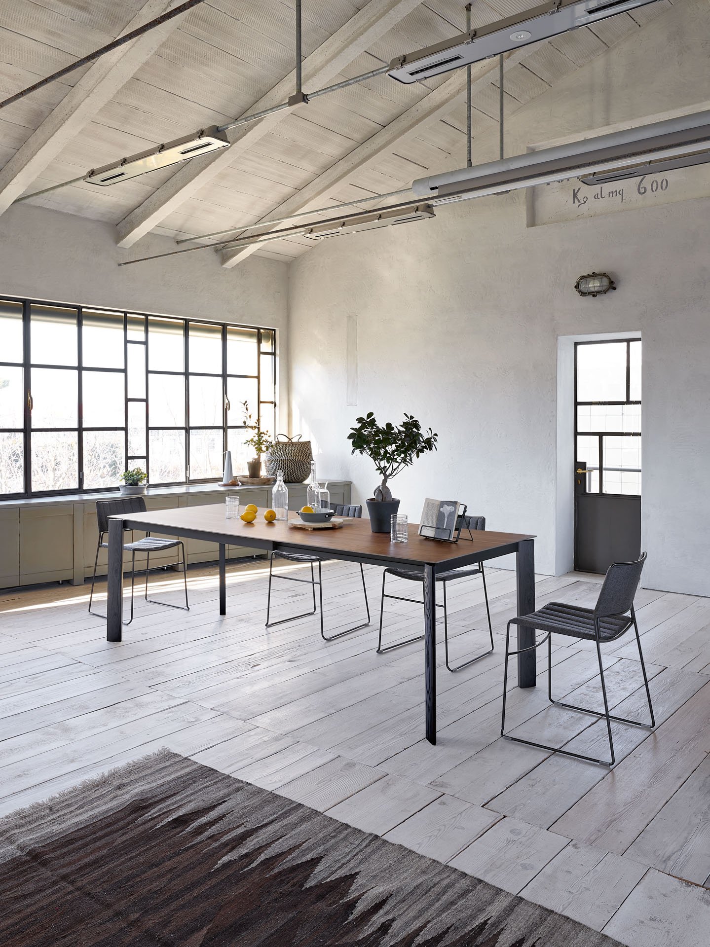 slim stackable chair in dark grey fabric