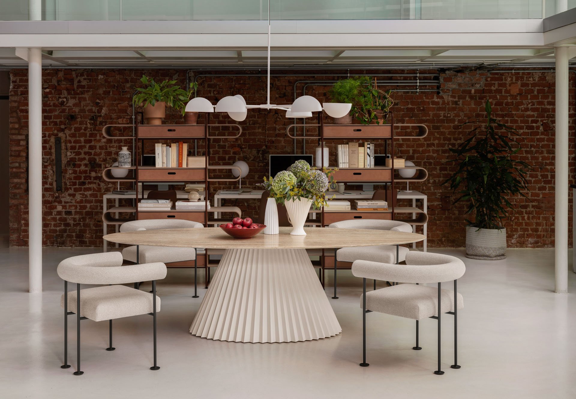MIDJ_Plissé_table_QUA-NDO_armchairs_CHARLOTTE_lamp_Apelle_bookcases