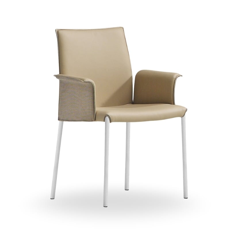 A modern chair with a beige upholstered seat and back, featuring armrests and sleek white legs.