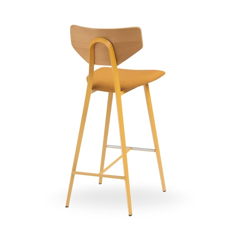 A modern yellow bar stool with a wooden backrest and metal legs, viewed from the back.