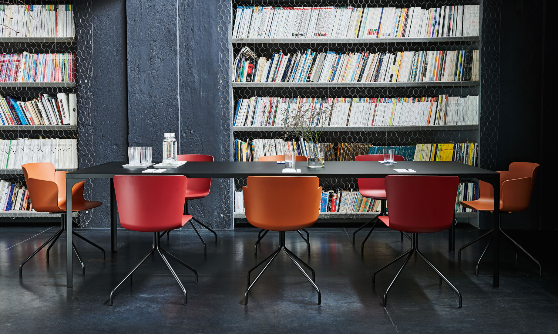 Calla chairs and armchairs, design Fabrizio Batoni. Armando table, design Balutto Associati.