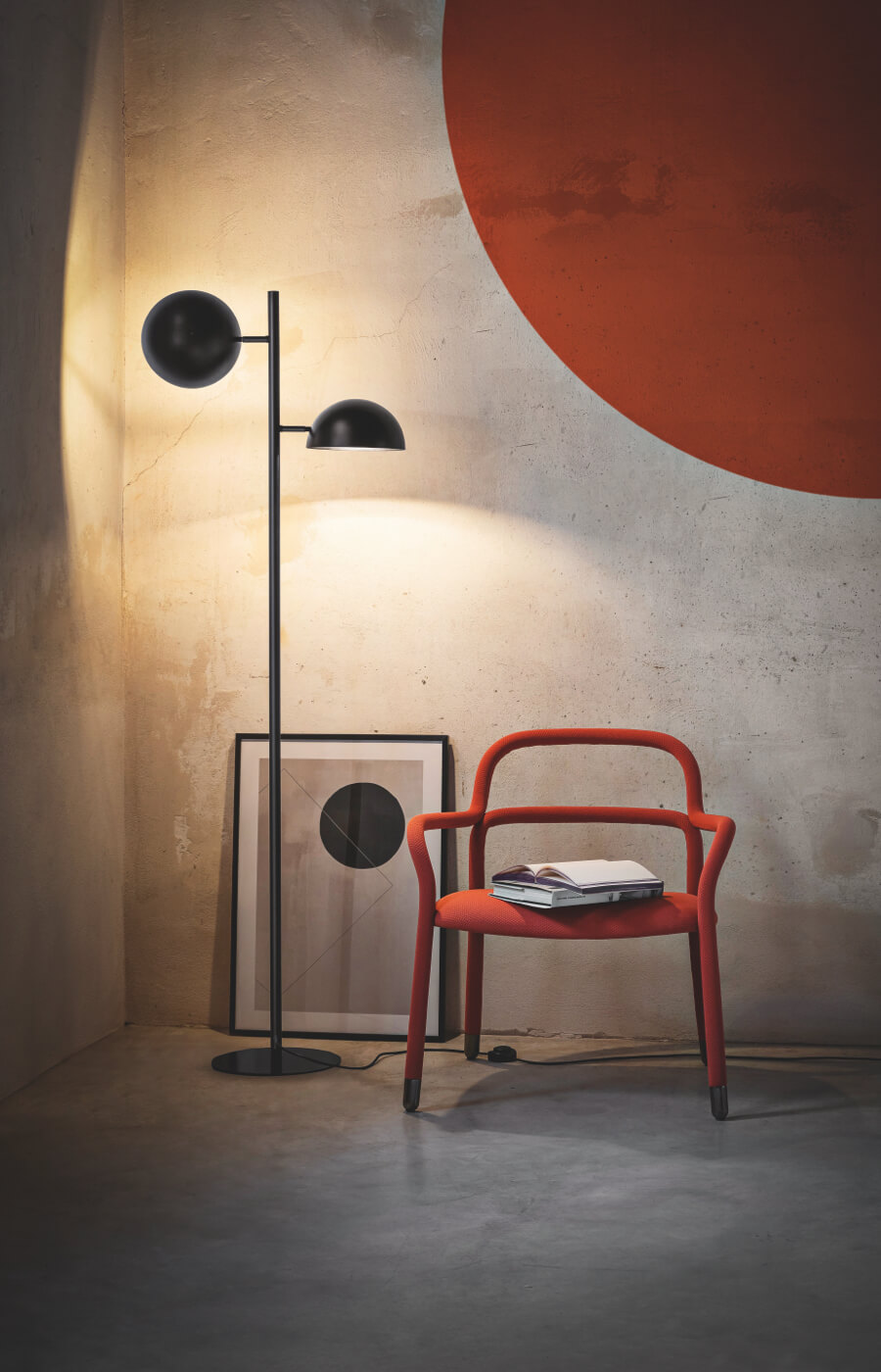 Charlotte floor lamp, design Tomas dalla Torre. Pippi armchair, design Roberto Paoli.