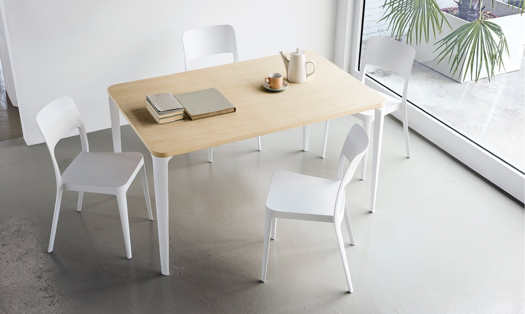 Nenè chairs and rectangular table, design Paolo Vernier.