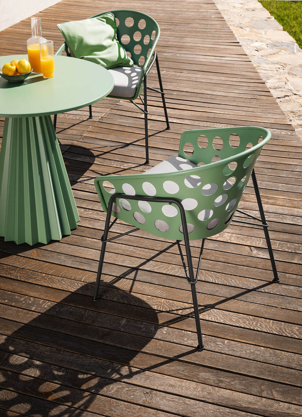 Bolle armchair in light green, design Paola Navone