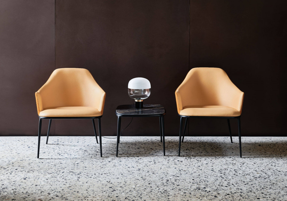 Lea lounge chairs in orange leather