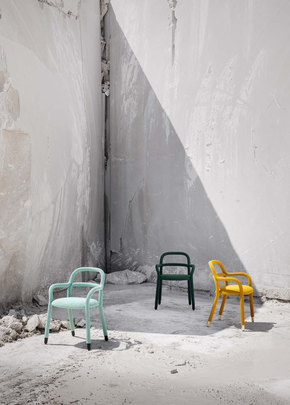 Pippi chairs with armrests in yellow, light blue and dark green fabric