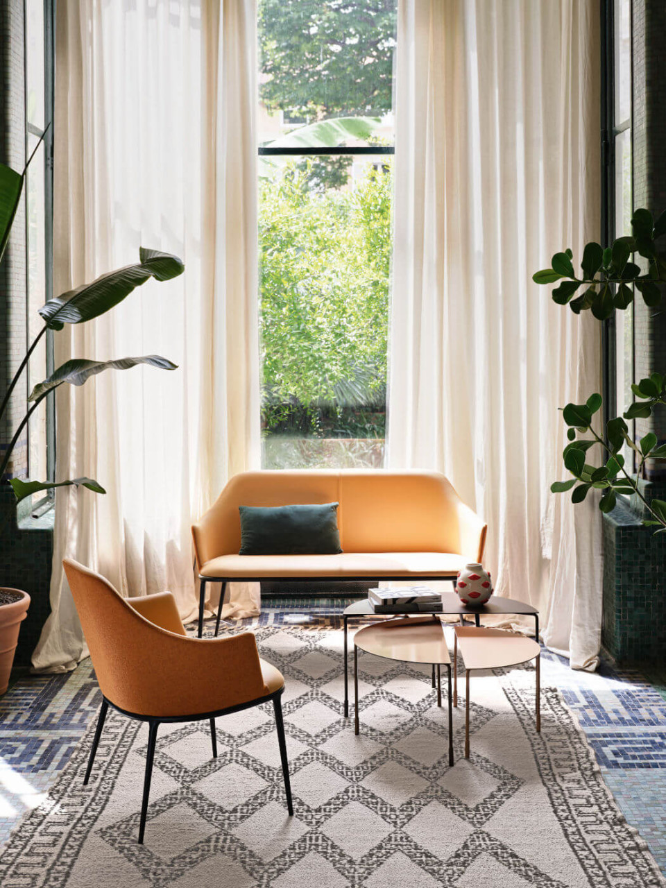 Lea sofa in orange fabric and leather