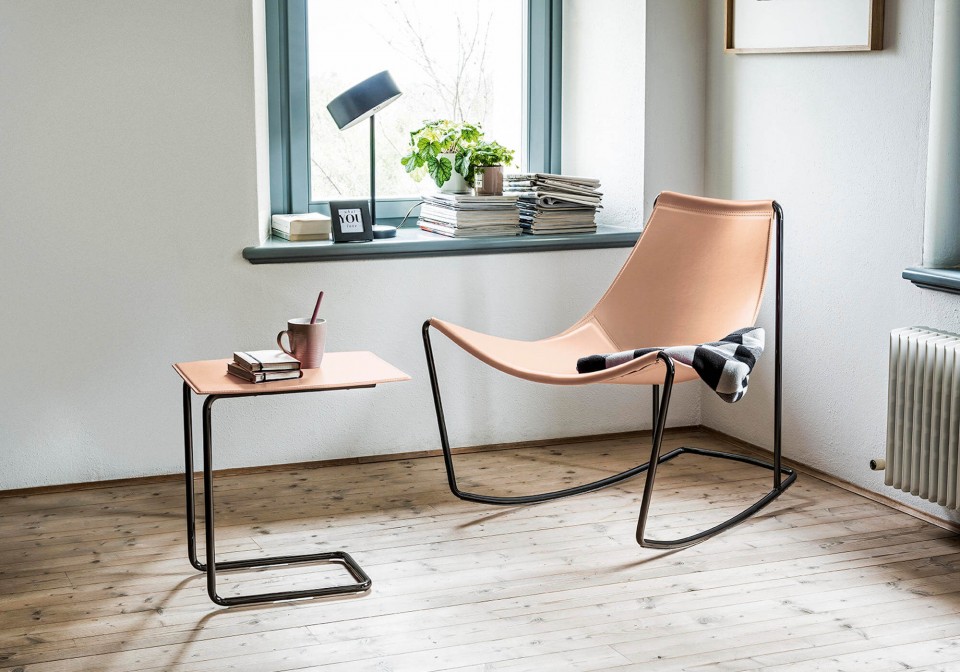 Apelle rocking chair with metal legs and pink hide seat