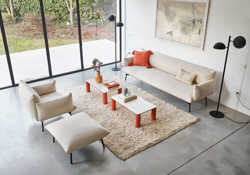 Area pouf with beige fabric