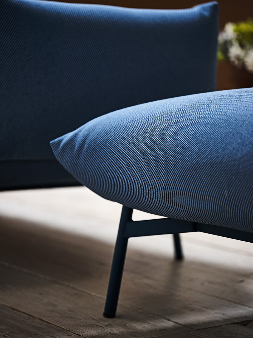 Area pouf with blue fabric