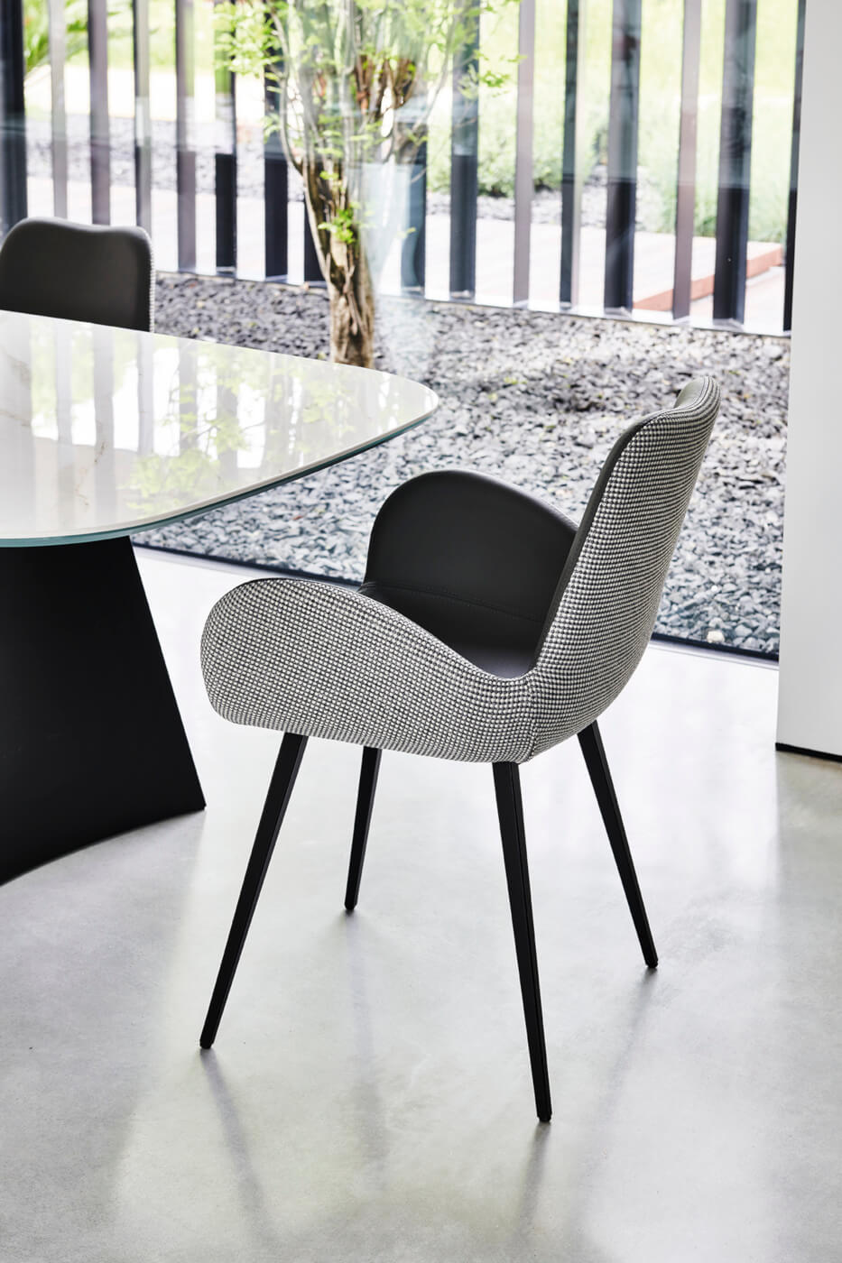 Dalia study chair with steel sled base and gray and black fabric seat