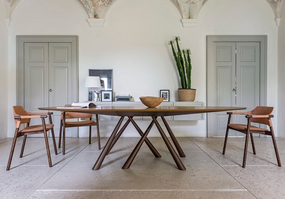 Oval Forest table with flamed walnut wood top and brown metal legs