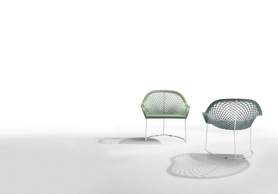 Armchair with white metal frame and green hide seat