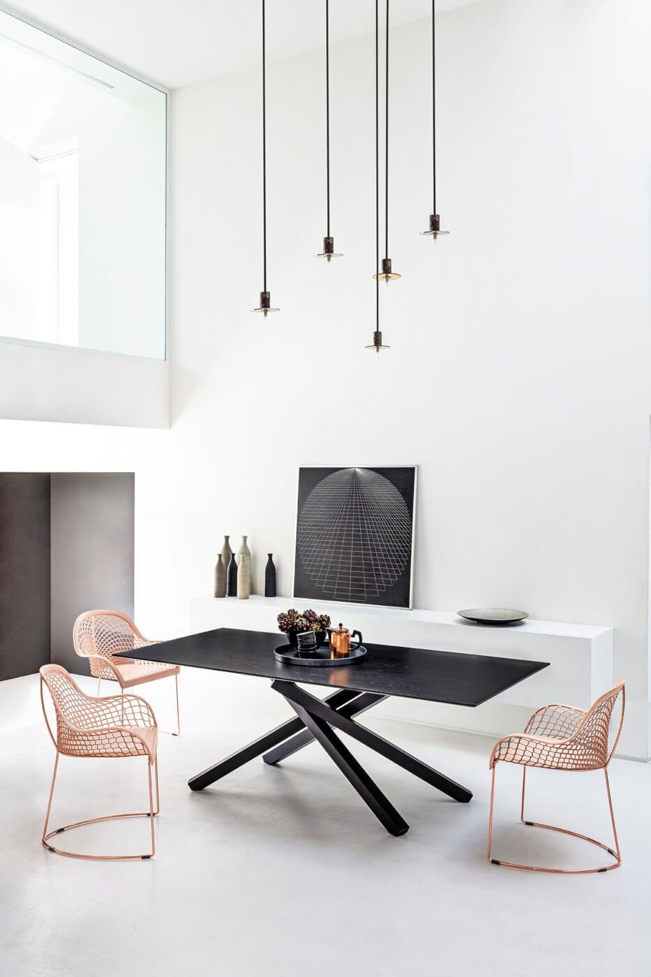 Guapa table chair with armrests with metal base and pink hide seat