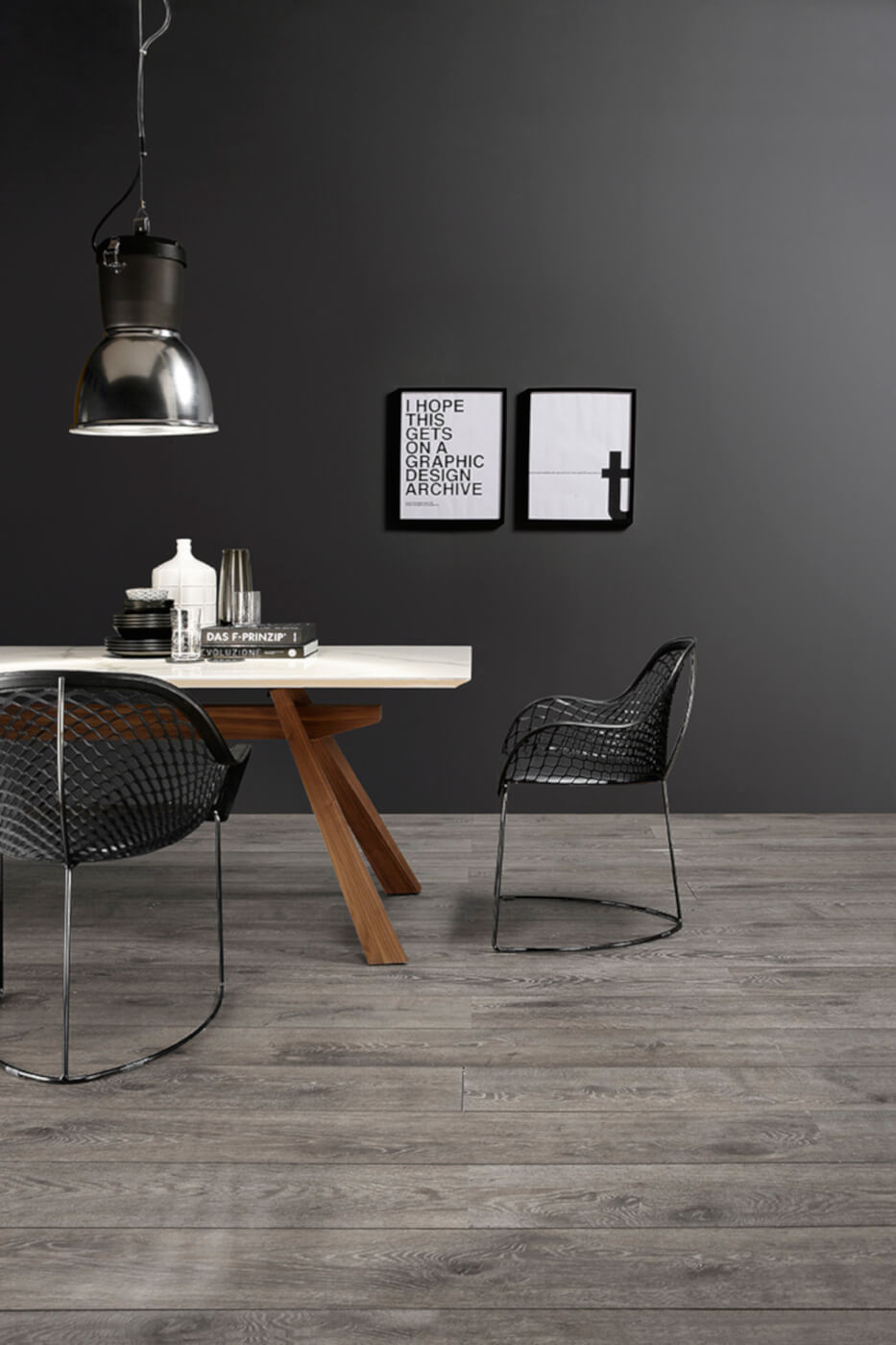 Guapa design armchair with black hide seat and black metal frame