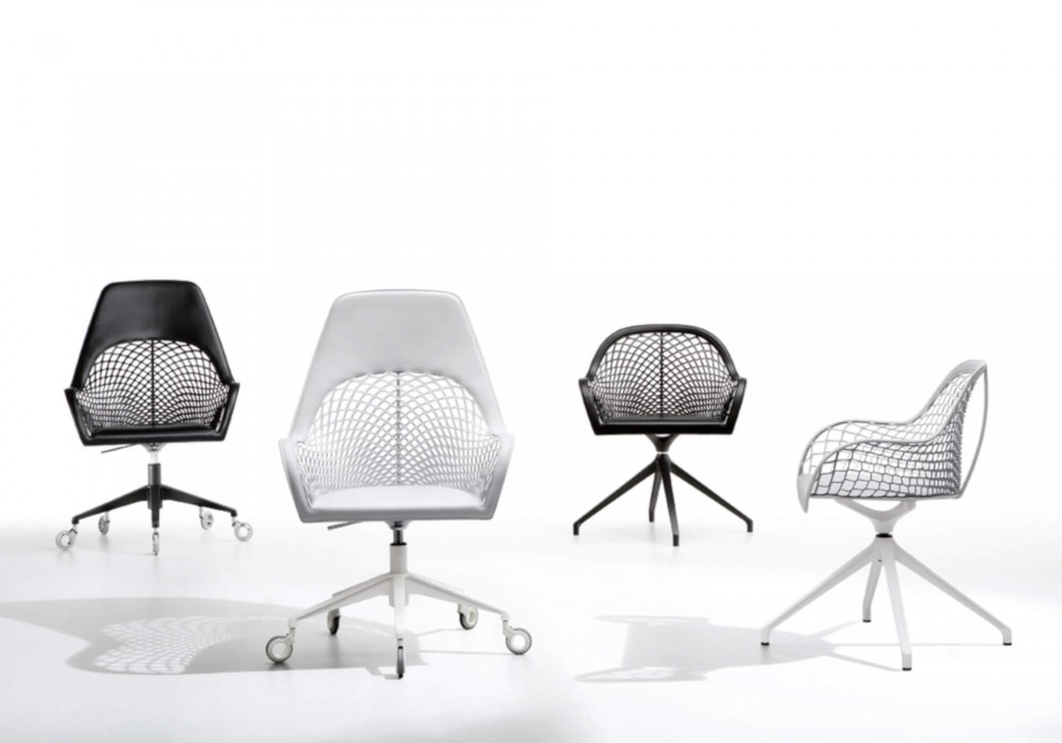 Guapa swivel armchair with black and white hide seat and black and white metal base