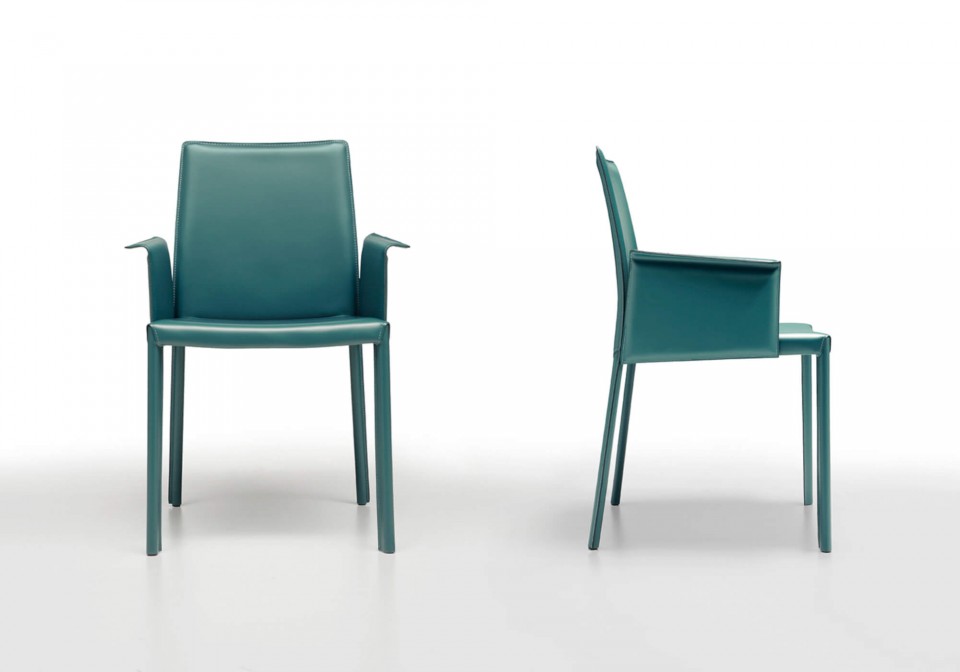 Nuvola low back armchair entirely covered in green hide