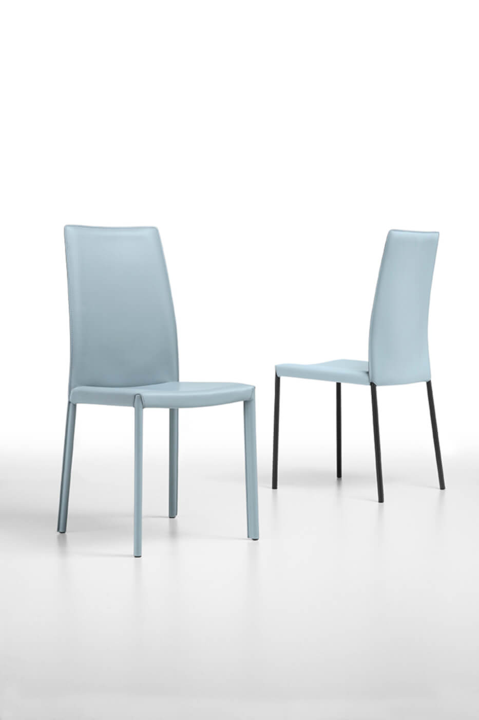 Nuvola chair with high back in light blue hide