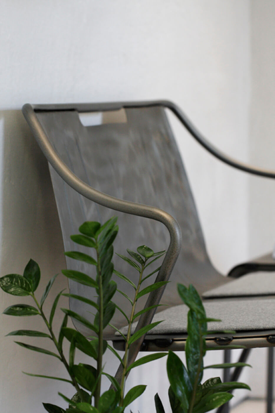 Detail of Ola seat in industrial effect steel