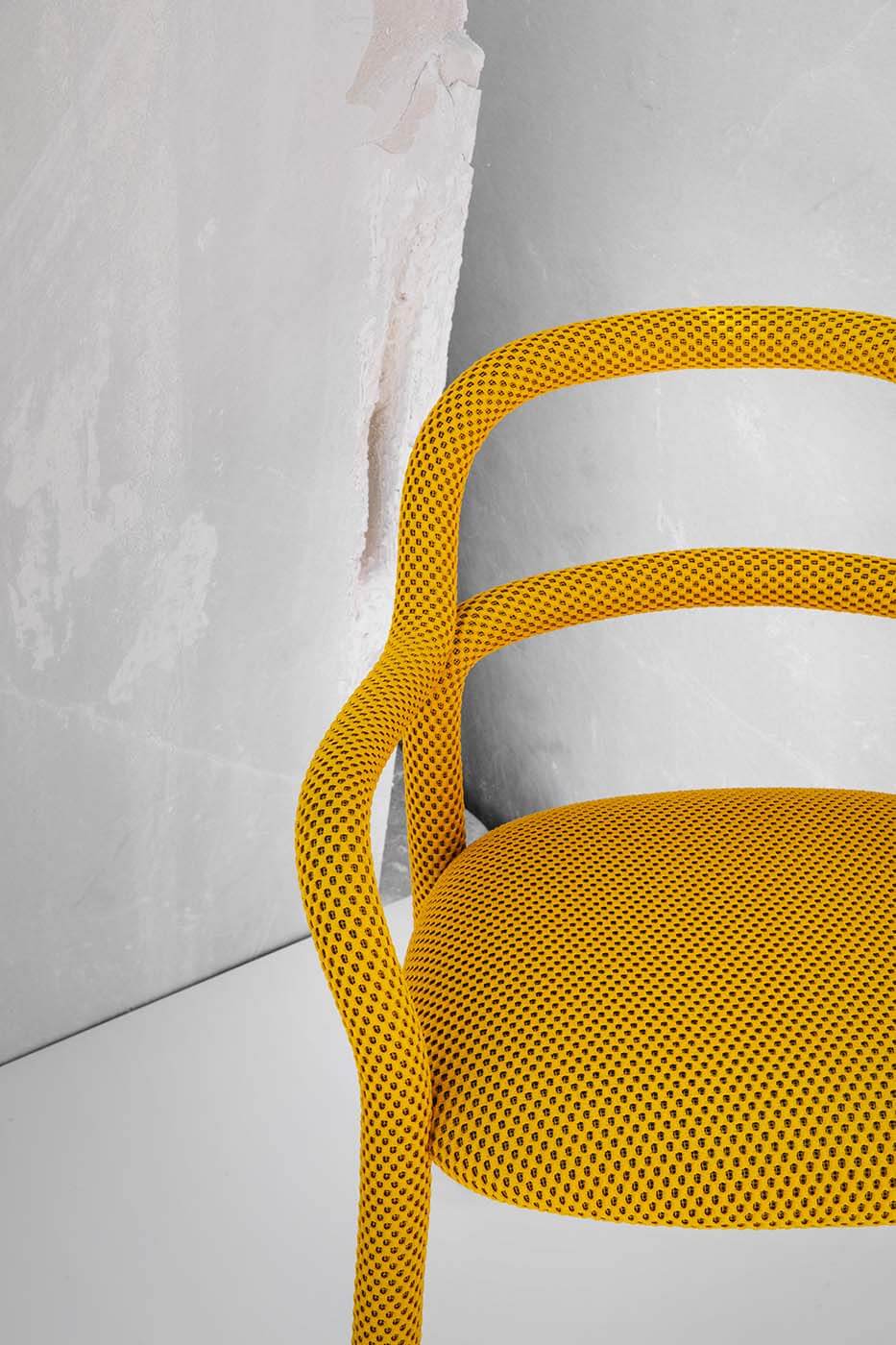 Pippi armchair in yellow fabric
