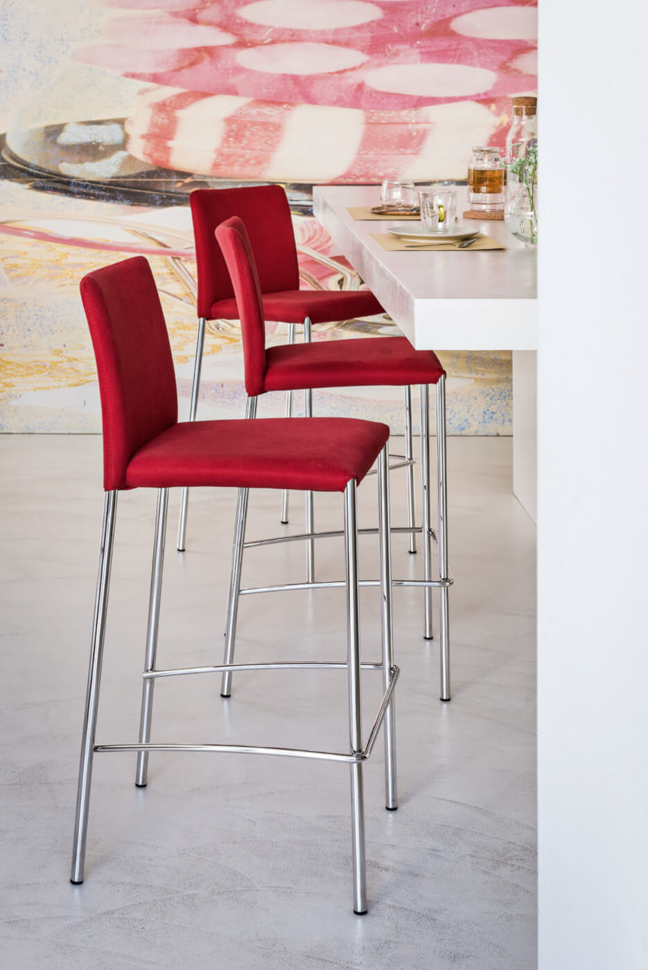 Silvy high stool with red fabric seat and metal base