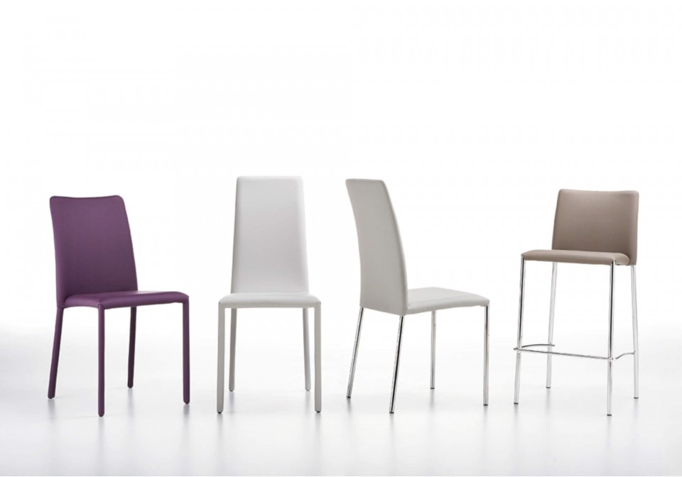 Silvy high back chair covered in white fabric and metal base