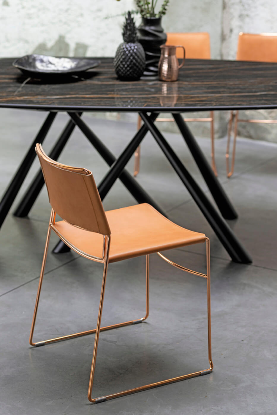 Slim chair with pink hide seat and pink gold metal base