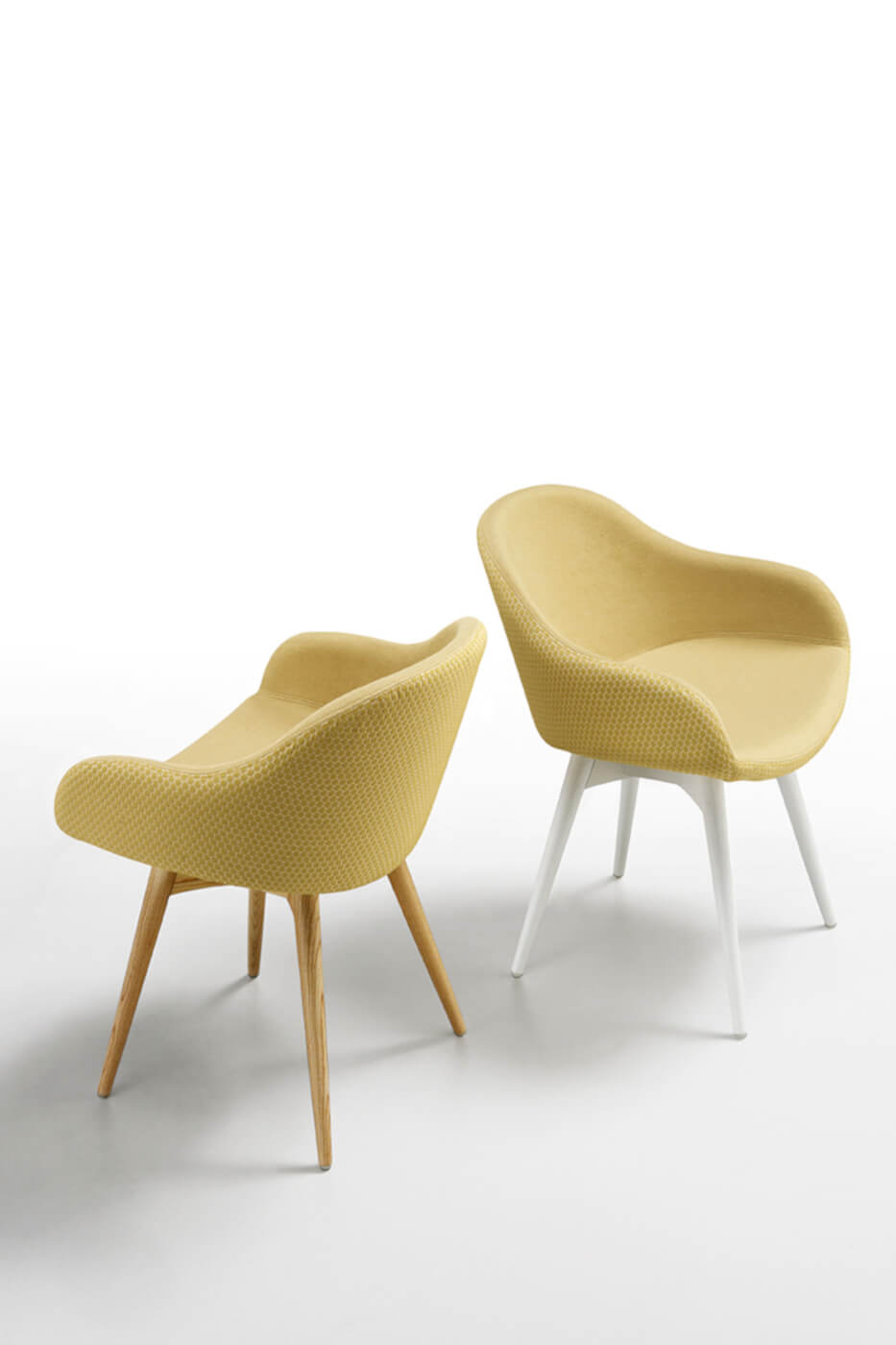 Sonny armchair with low armrest, covered in yellow fabric
