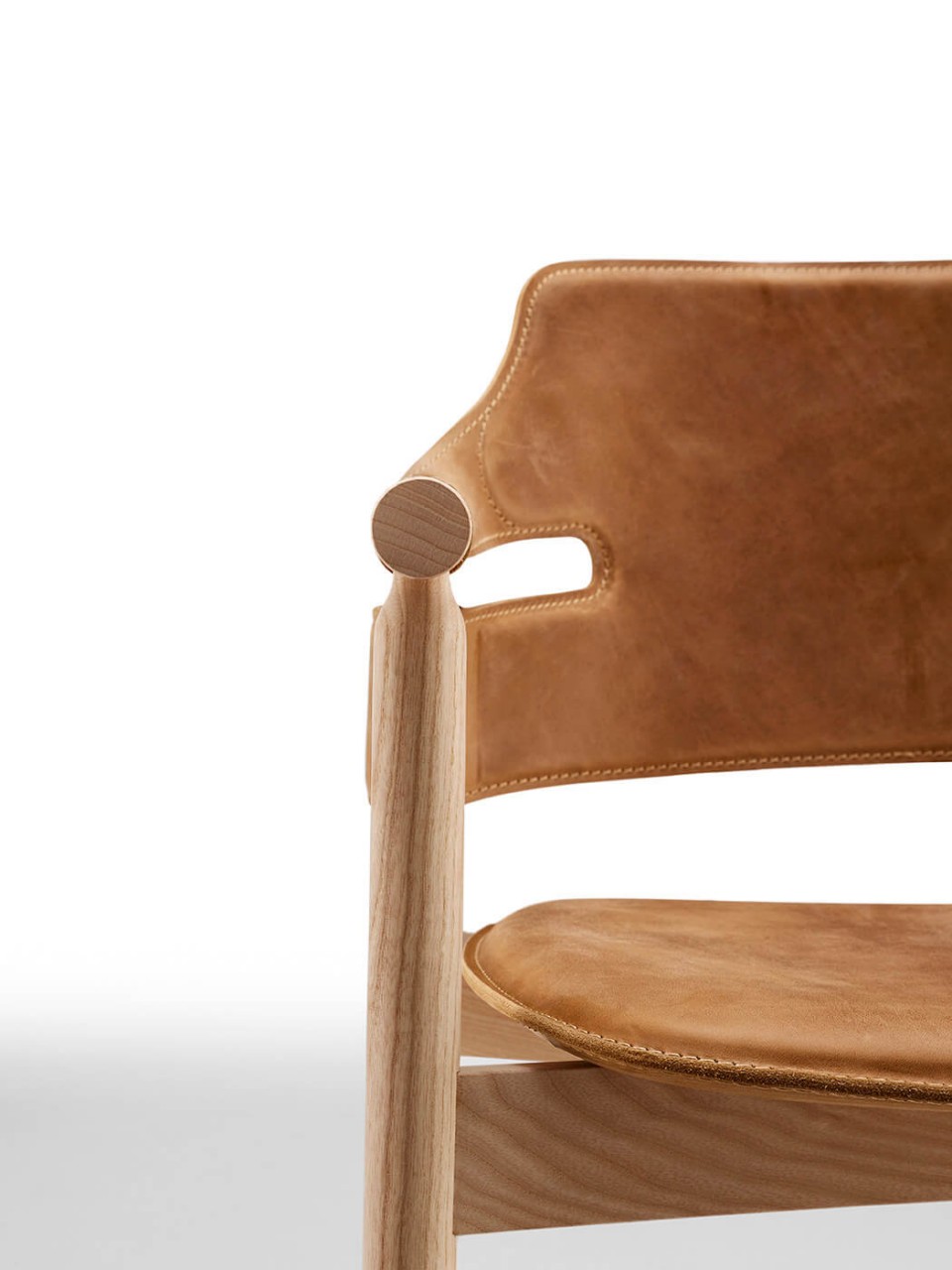 Suite armchair seat detail in brown leather