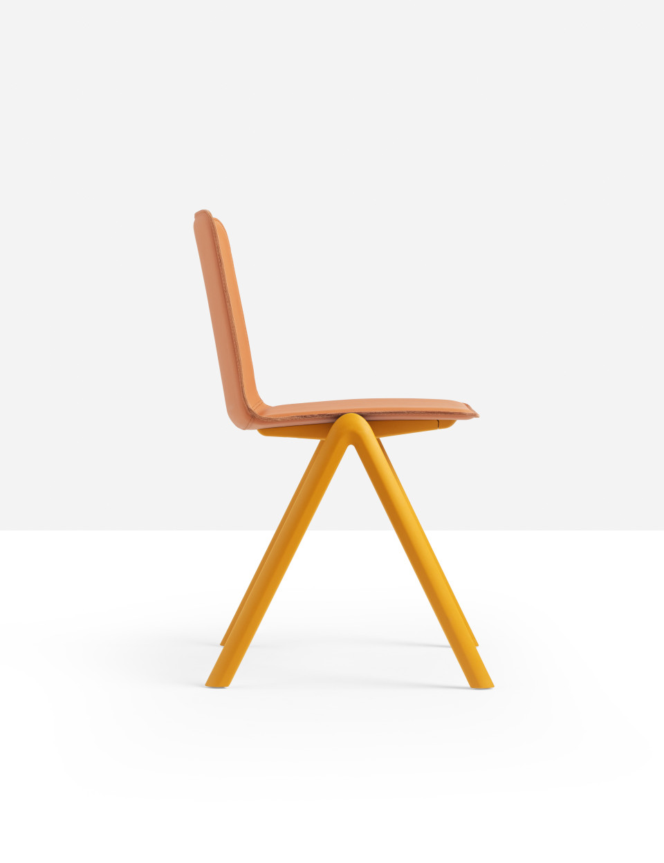 Stack stackable chair with four-legs base in polypropylene with shell upholstered in hide MIDJ