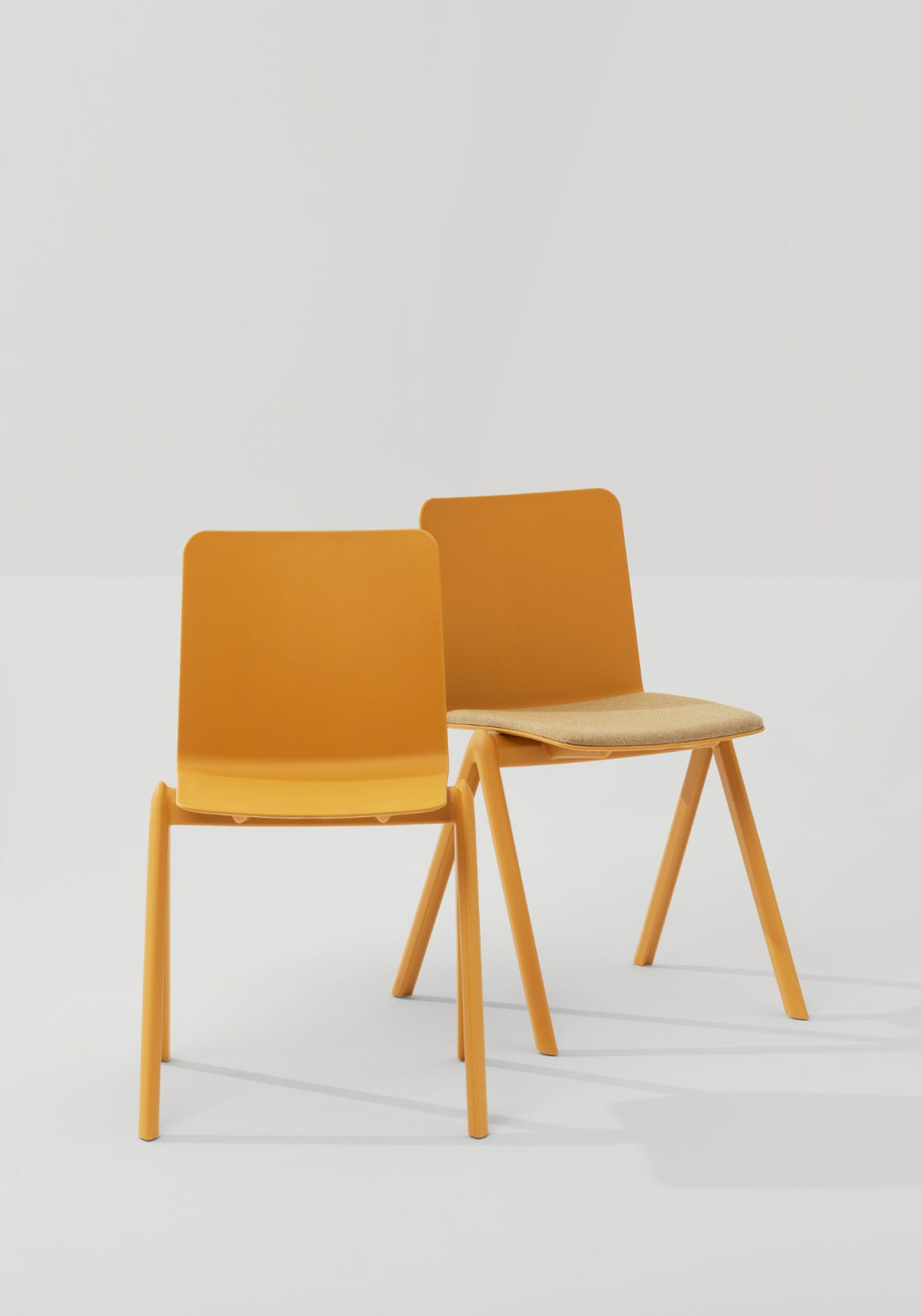 Stack stackable chair with four-legs base in polypropylene with upholstered seat MIDJ