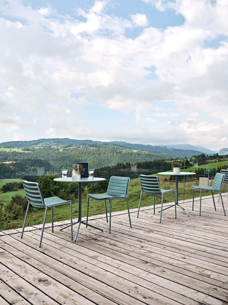Tampoliere outdoor table with base with three legs in light blue steel