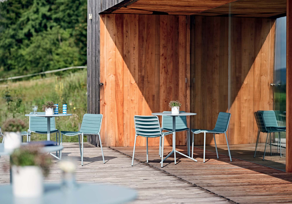 Trampoliere outdoor table with base with three legs in light blue steel