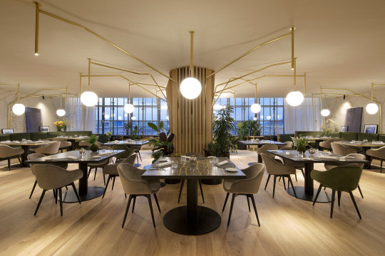 La Pista restaurant and Sonny armchairs by Midj In Italy