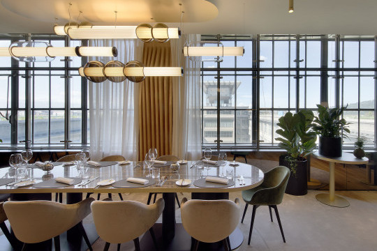 La Pista restaurant and Sonny armchairs by Midj In Italy