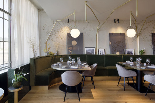 La Pista restaurant and Sonny armchairs by Midj In Italy