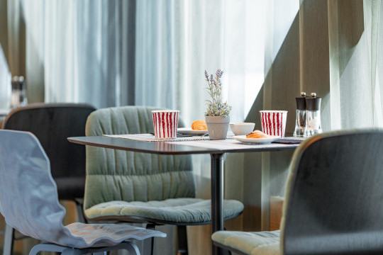 Liù chairs at Radius Hotel's restaurant in Tibilisi