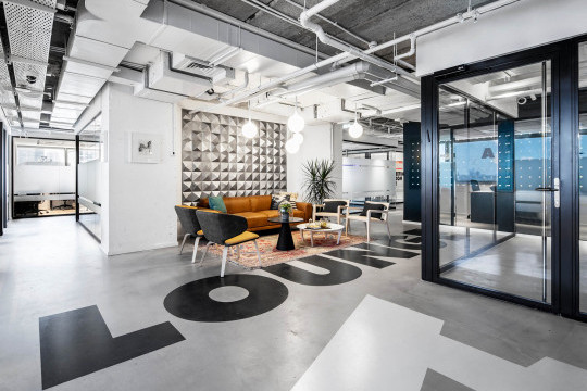 Wrap lounge chairs at Rooms co-working